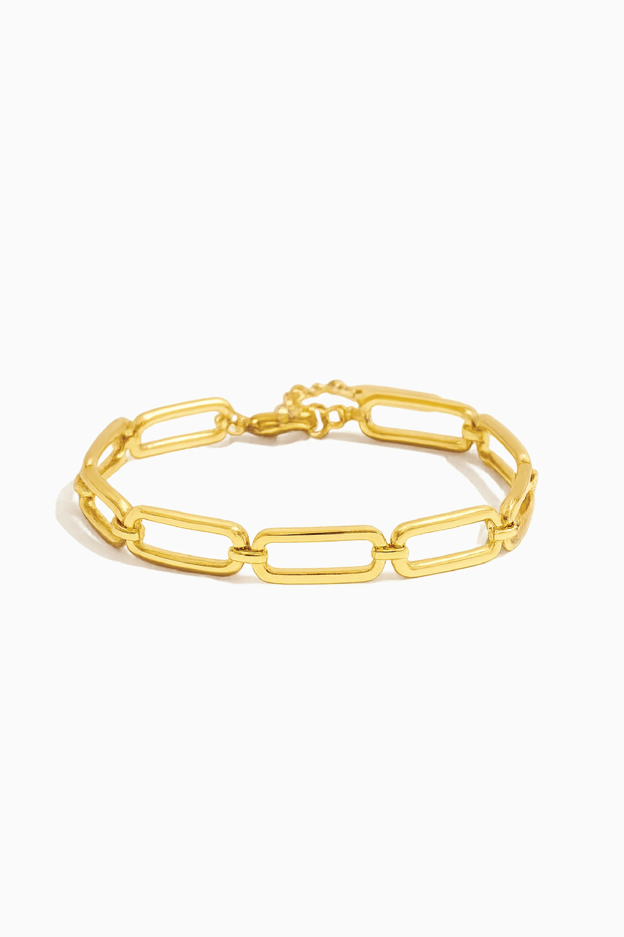 Gold chain bracelet on a white background