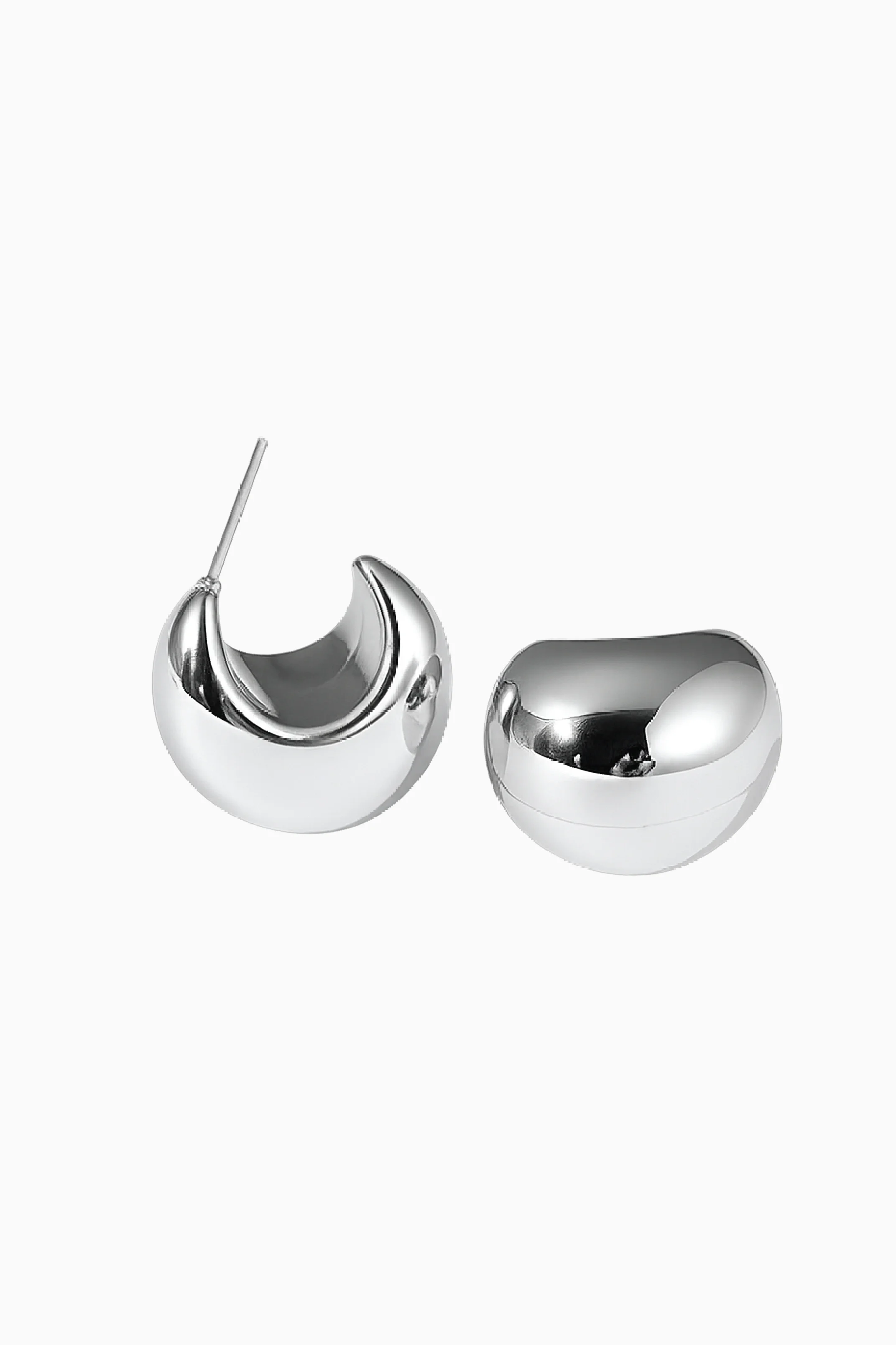 Pair of silver earrings on a white background