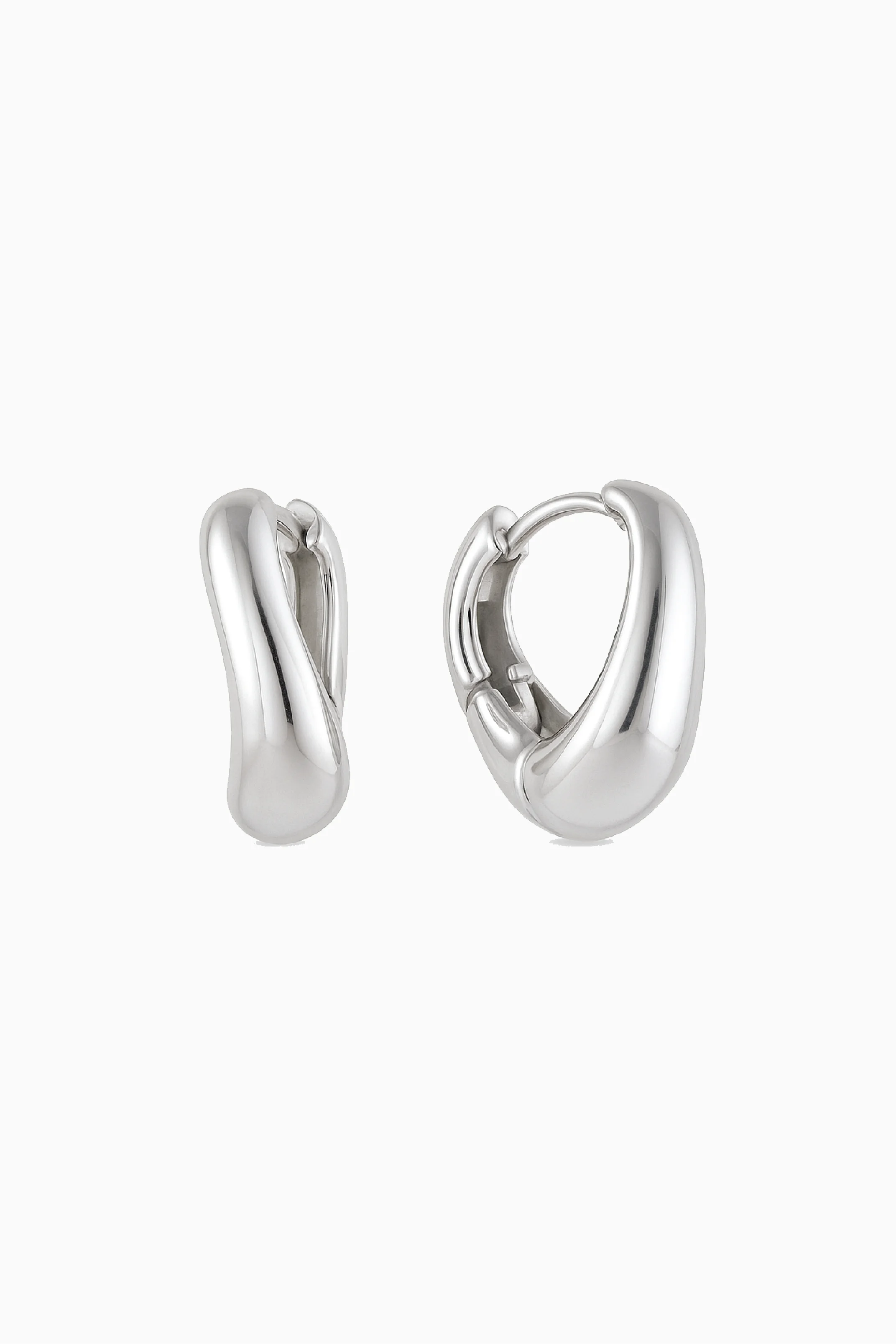Pair of silver hoop earrings on a white background