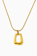Gold necklace with a unique pendant on a white background